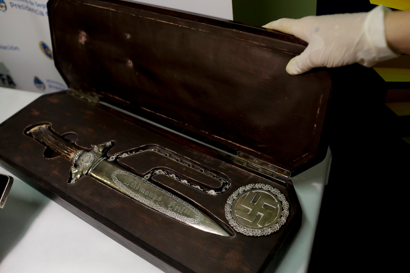 A knife with Nazi markings is seen at the Interpol headquarters in Buenos Aires, Argentina (AP Photo/Natacha Pisarenko)